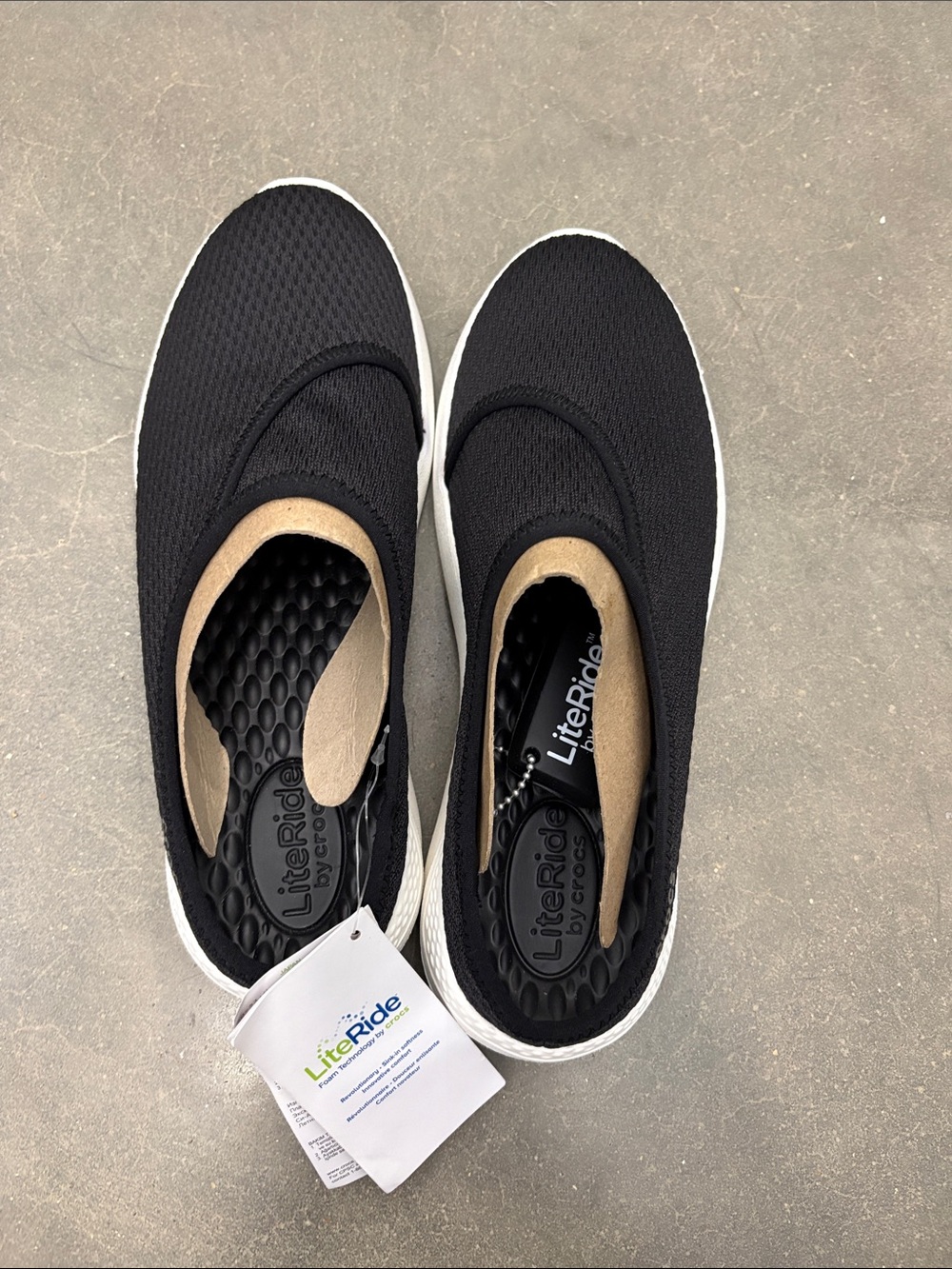 CROCS LiteRide Slip-On Sneakers in Black and White